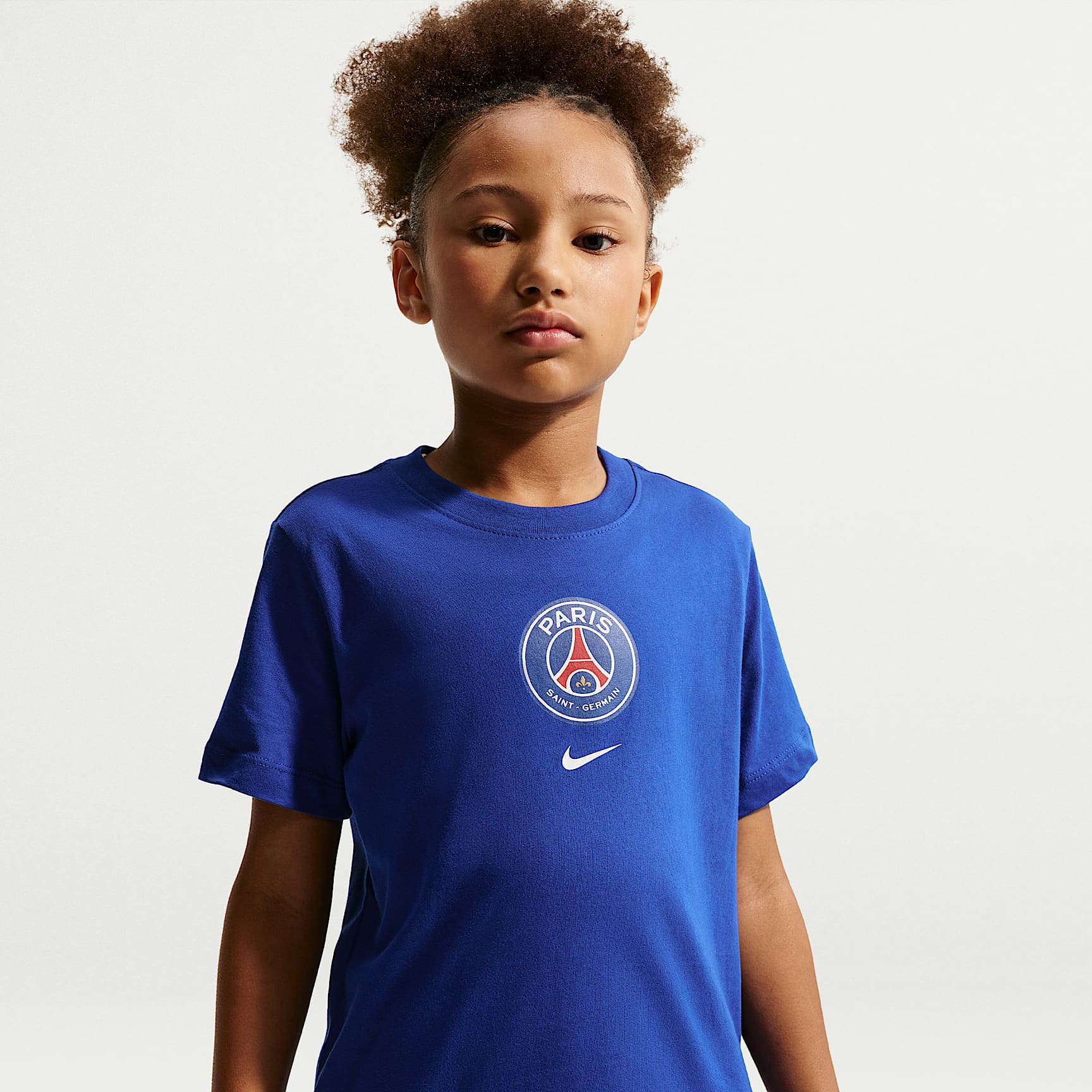 Paris Saint-Germain Older Kids' Nike Football T-shirt. Nike PT